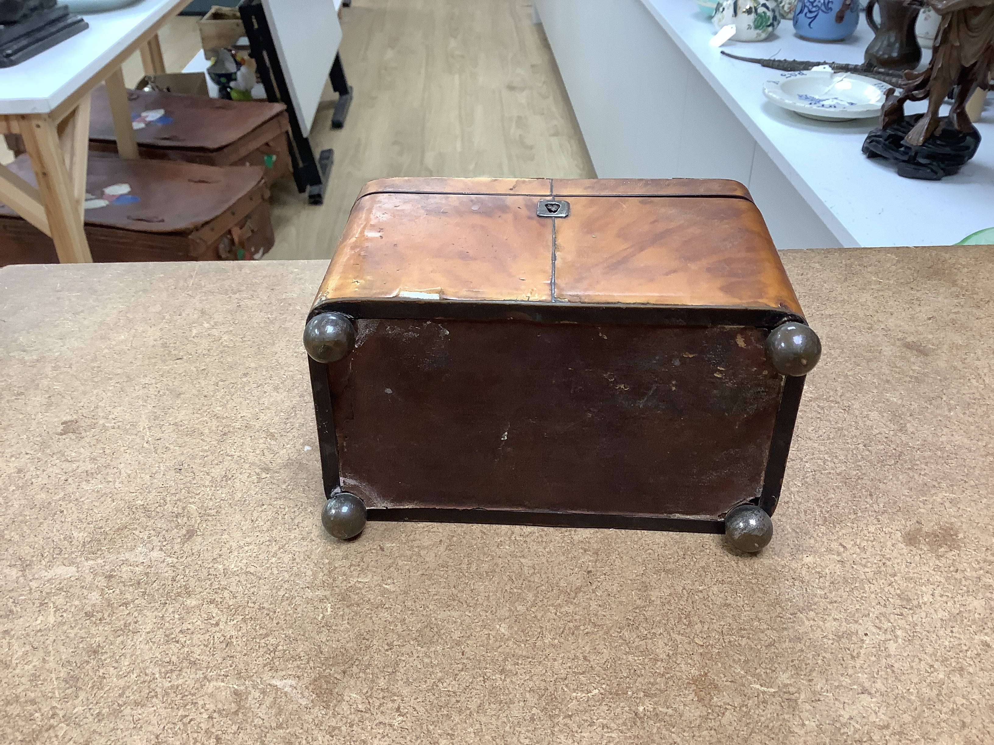 A 19th century two section tortoiseshell tea caddy on ball feet, a tortoiseshell necessaire case and a tortoiseshell and mother of pearl inlaid card case. tea caddy 15cm wide x 11cm high x 9cm deep CITES Submission refer